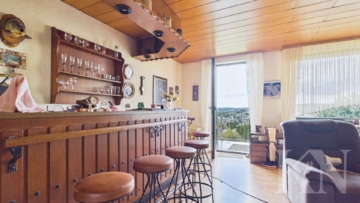 Wohnzimmer EG - Mehrfamilienhaus mit Fernblick & vier Wohneinheiten in attraktiver Lage von Riegelsberg!