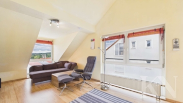 Wohnbereich - Wohnen in Riegelsberg – Gepflegte Dachgeschosswohnung mit Balkon