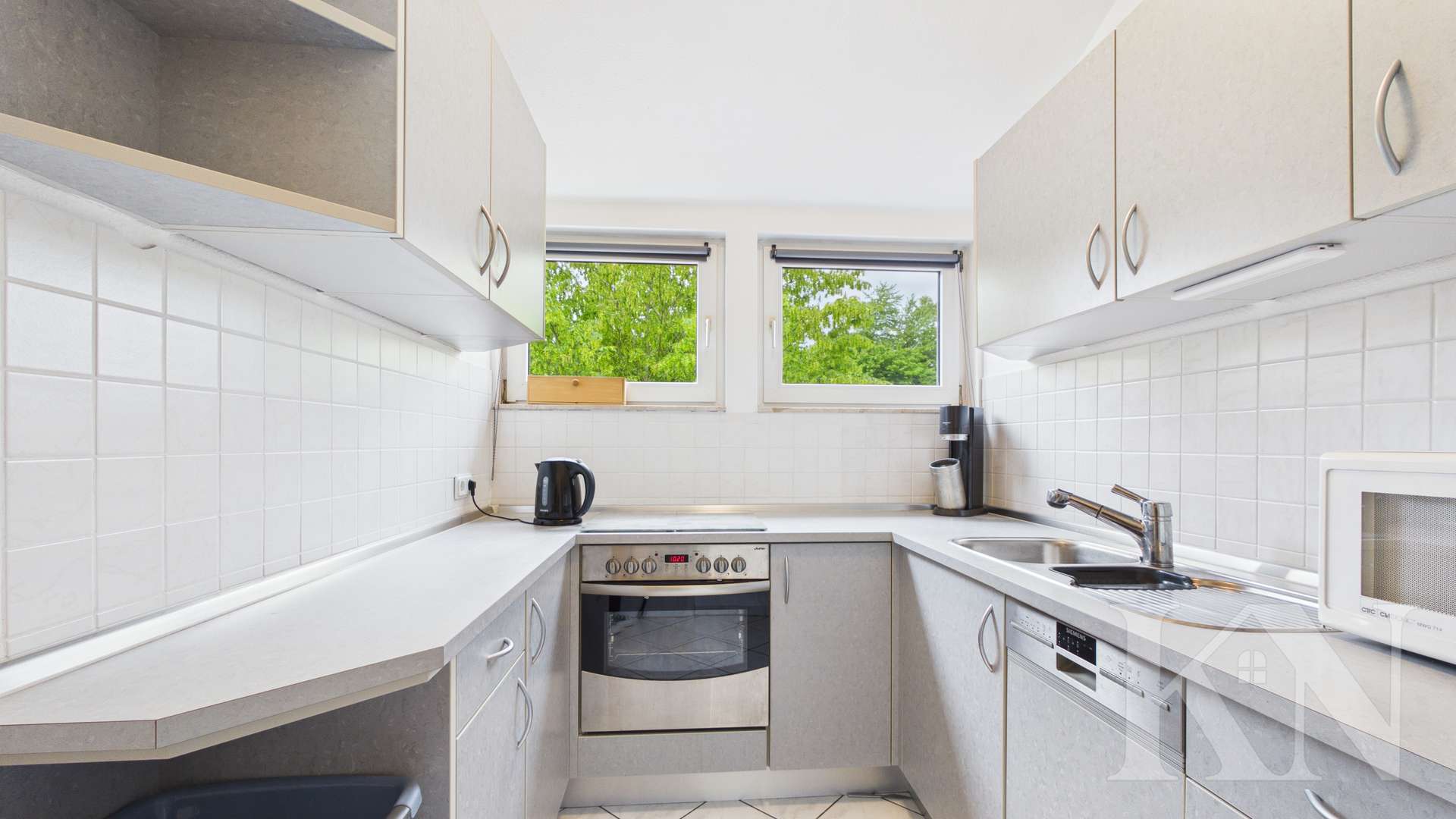 Küche - Wohnen in Riegelsberg – Gepflegte Dachgeschosswohnung mit Balkon