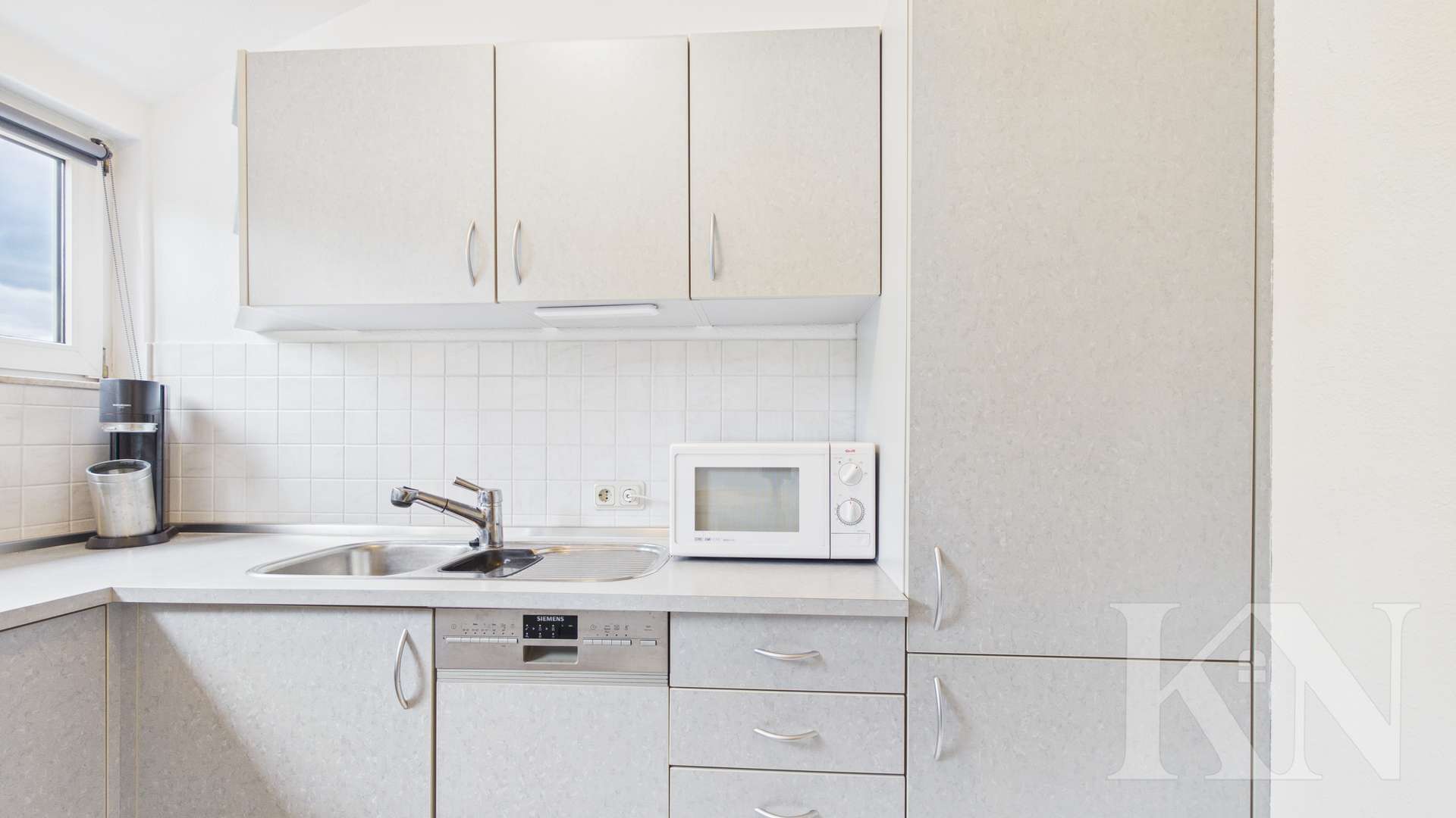 Küche - Wohnen in Riegelsberg – Gepflegte Dachgeschosswohnung mit Balkon
