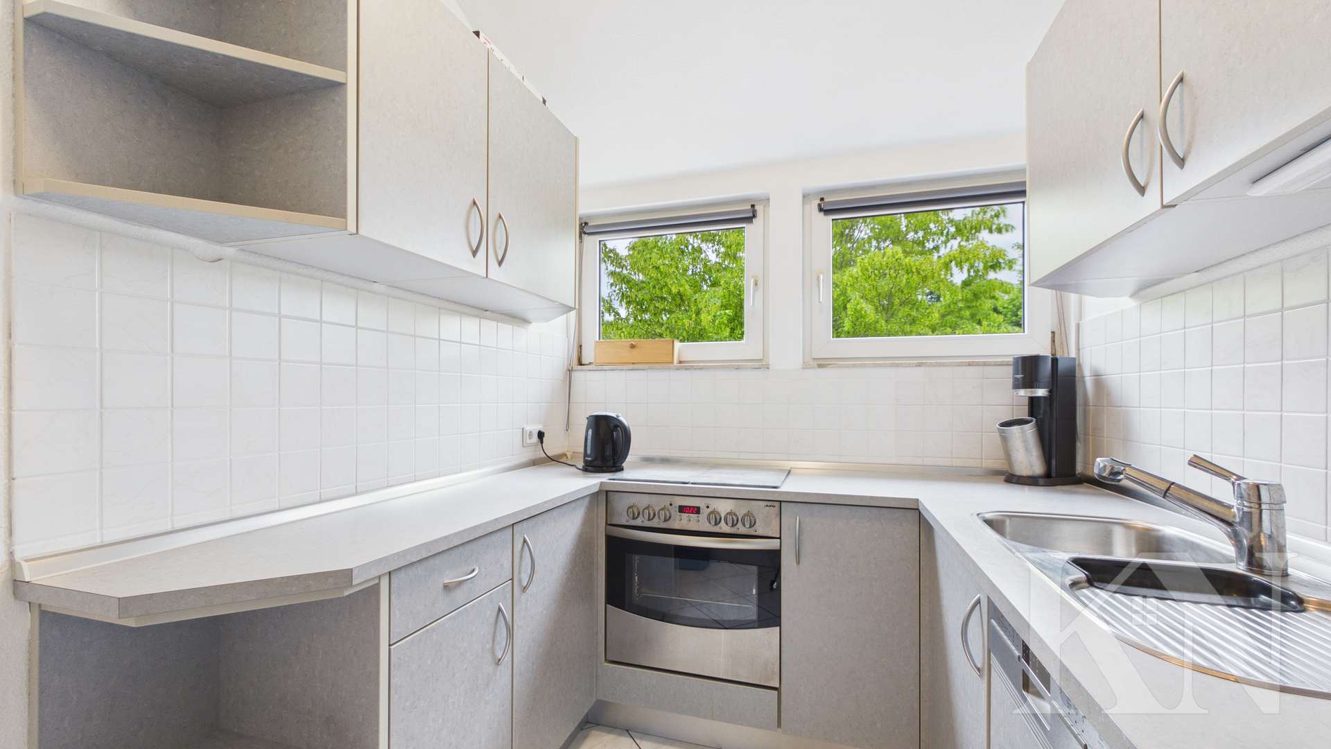 Küche - Wohnen in Riegelsberg – Gepflegte Dachgeschosswohnung mit Balkon