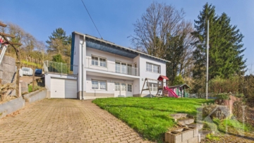 Großzügiges Wohnen in Merzig – Einfamilienhaus mit Garten, Balkon & Wintergarten, 66663 Merzig, Einfamilienhaus