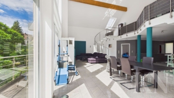 Wohn- / Essbereich - Besondere Architektur trifft großzügiges Wohnen – Einfamilienhaus mit Einliegerwohnung