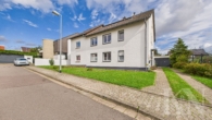 Front - Zwei,- bis Dreifamilienhaus in Top-Lage