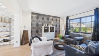 Wohnzimmer - Sofort beziehbares Einfamilienhaus mit Garten und traumhaften Fernblick!