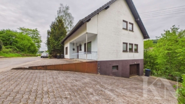 Seitenansicht - Einfamilienhaus mit großem Grundstück und vielseitigem Potenzial