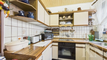 Küche EG - Charmantes Ein-Zweifamilienhaus in Spiesen-Elversberg