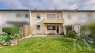 Rückansicht - Ihr neues Zuhause in Riegelsberg – charmantes Einfamilienhaus mit Balkon, Terrasse & Garage!
