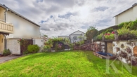 Garten - Ihr neues Zuhause in Riegelsberg – charmantes Einfamilienhaus mit Balkon, Terrasse & Garage!