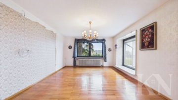 Wohnzimmer - Freistehendes Einfamilienhaus in ruhiger Feldrandlage von Püttlingen – Platz für die ganze Familie